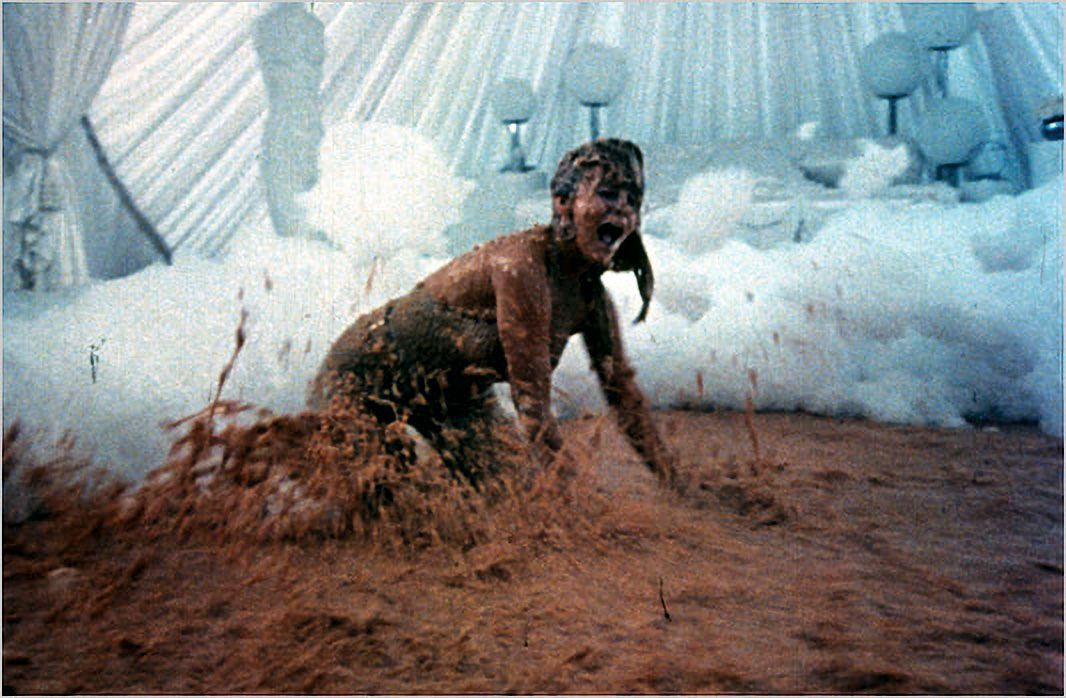 Still from the movie, Tommy, showing Anna Margaret frolicking in a sea of baked beans.
