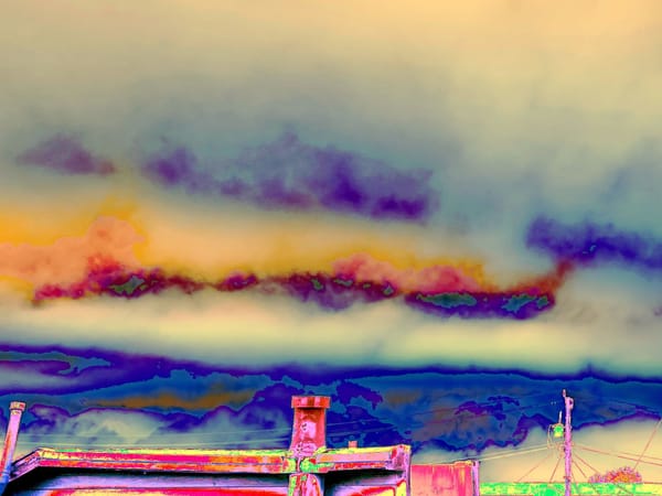 Abstract colorful image that shows a roofline and some telephone poles. It's meant to be psychedelic whimsy.